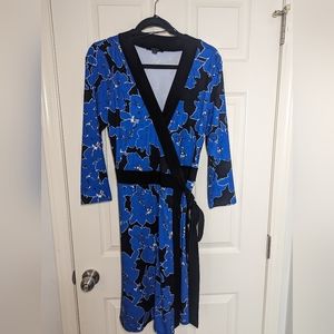 Long sleeve blue and black wrap dress